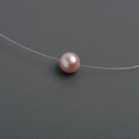 Colier delicat cu o perlă mov pal de 8-9 mm. Lungime 40cm.