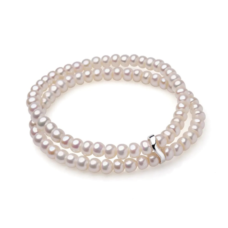 Brăţară perle de cultură albe sfere aprox. 5-5.5mm, pe elastic, lungime 18cm.
